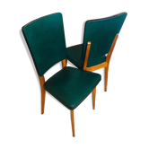 Two 1950s chairs made of wood and skai