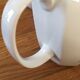 Vintage porcelain coffee or teapot with milk jug