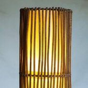 Mid-century rattan floor lamp, in the style of Louis Sognot.