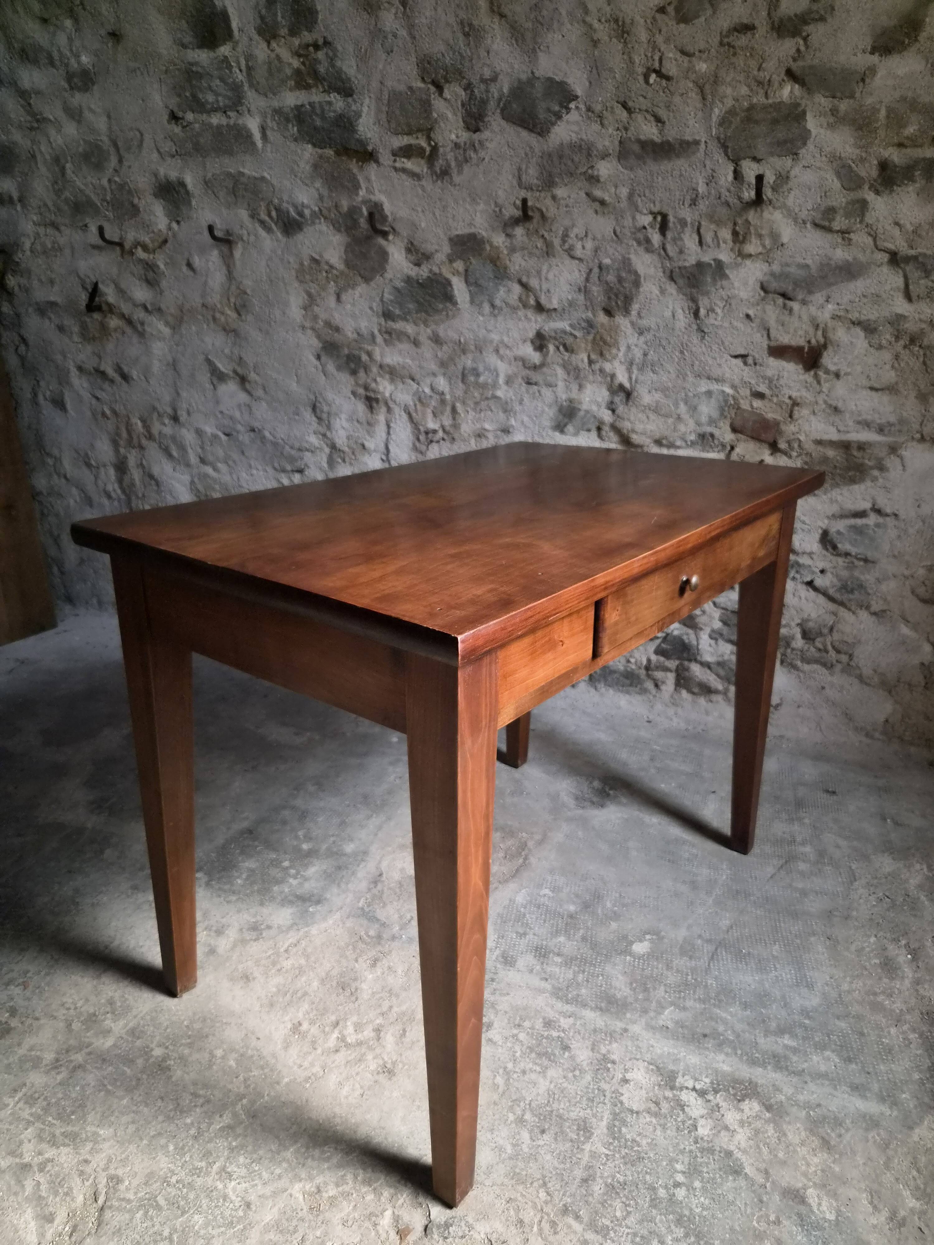 Old French table in cherry wood with bistro chair, circa 1900–1930.