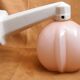 Applied art deco in white porcelain and pink opaline globe