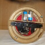 Old toy made of wood, aluminum and fabrics, animated and musical merry-go-round