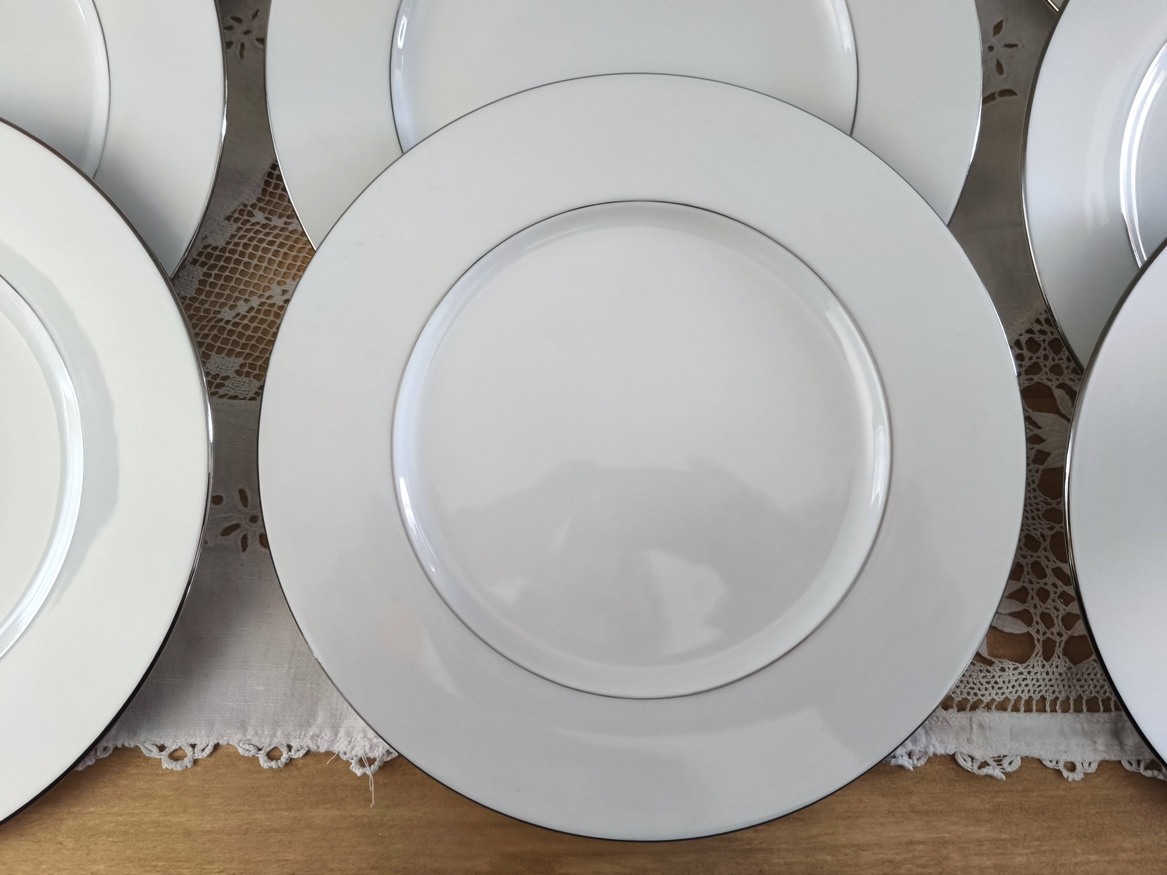 Set of 12 white porcelain dinner plates with double silver rim