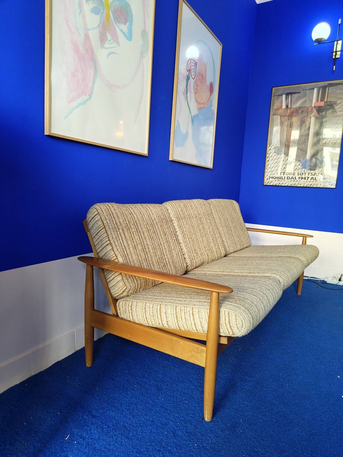 Scandinavian sofa in wood and vintage fabric from the 60s