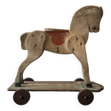 Jouet ancien/vintage cheval en bois à roulettes années 50