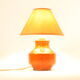 Orange ceramic table lamp with geometric imprints, 1970s.