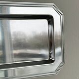 Small rectangular tray made of lightweight metal.