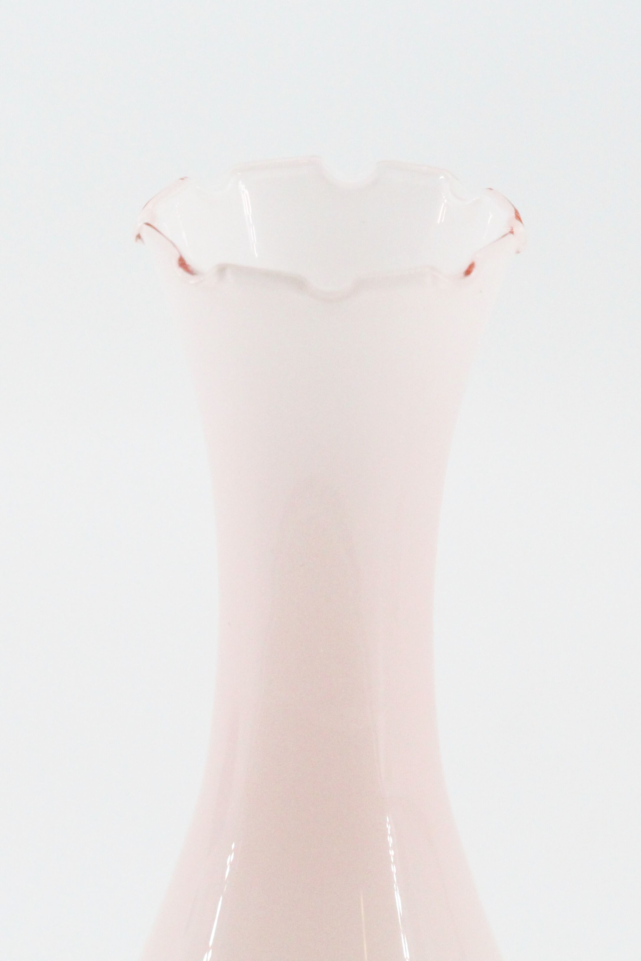 Old vase in pink opaline