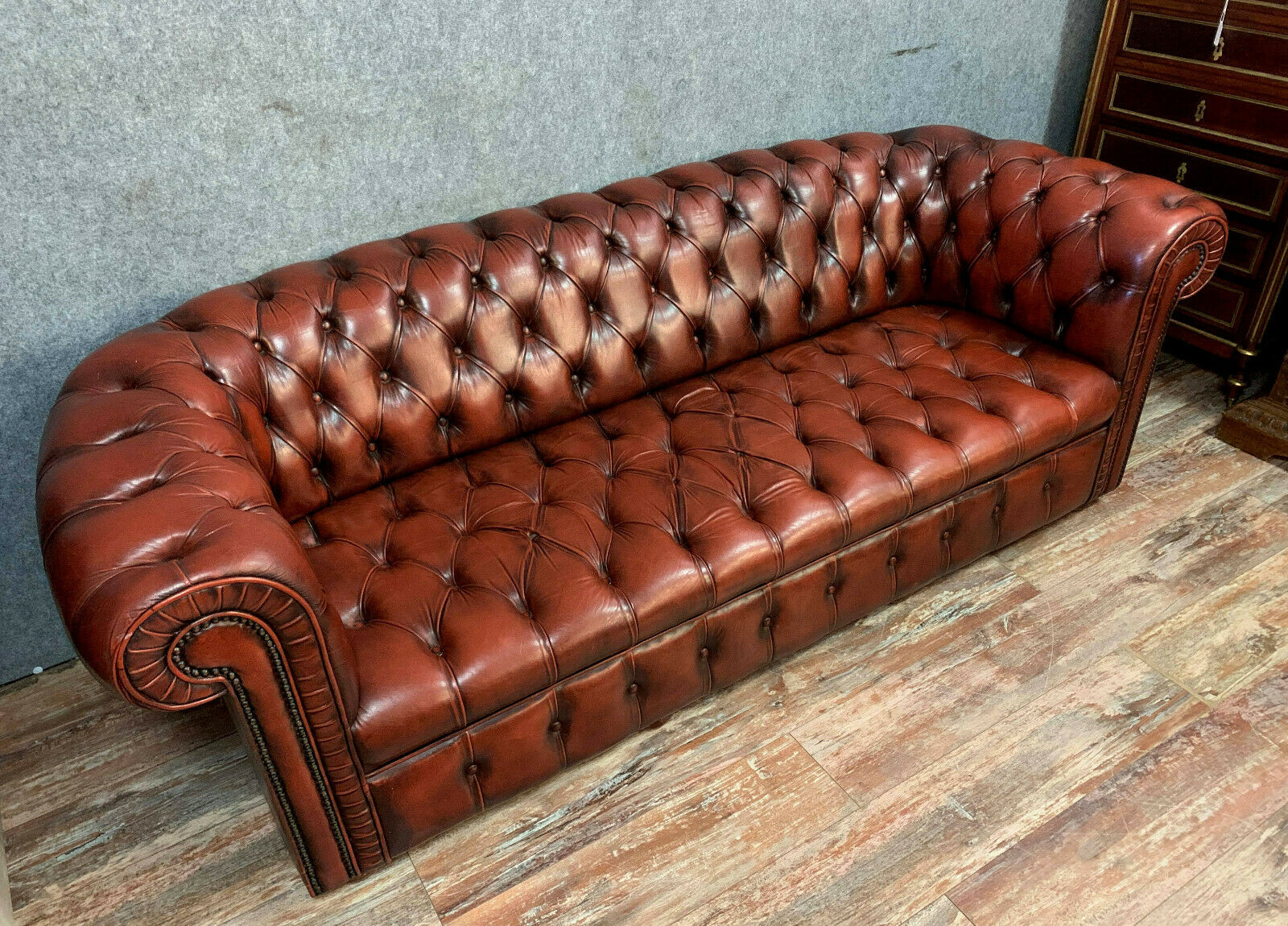 Chesterfield sofa in burgundy upholstered leather circa 1920