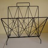 Magazines rack with very fine black metal geometric