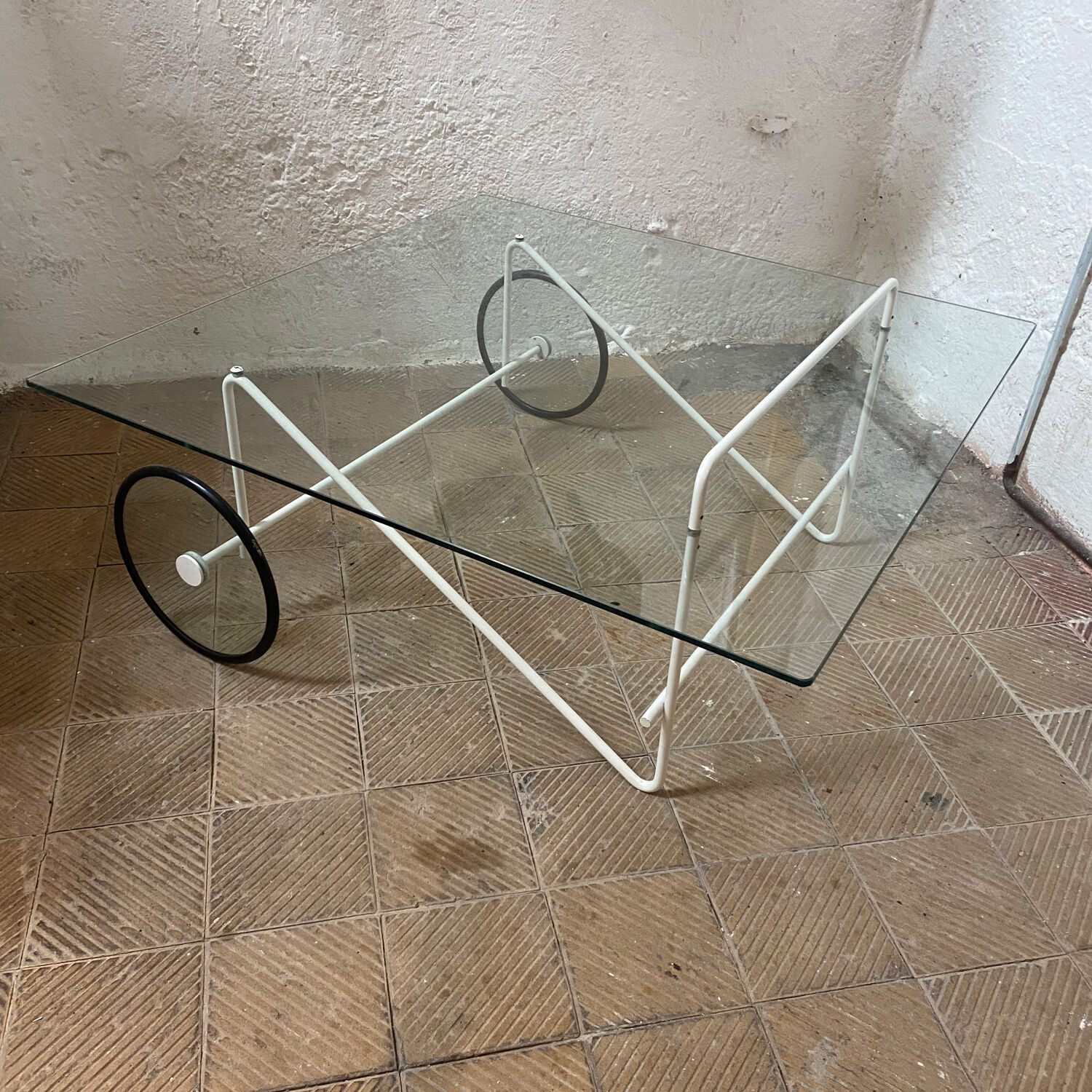 Italian glass coffee table with castors