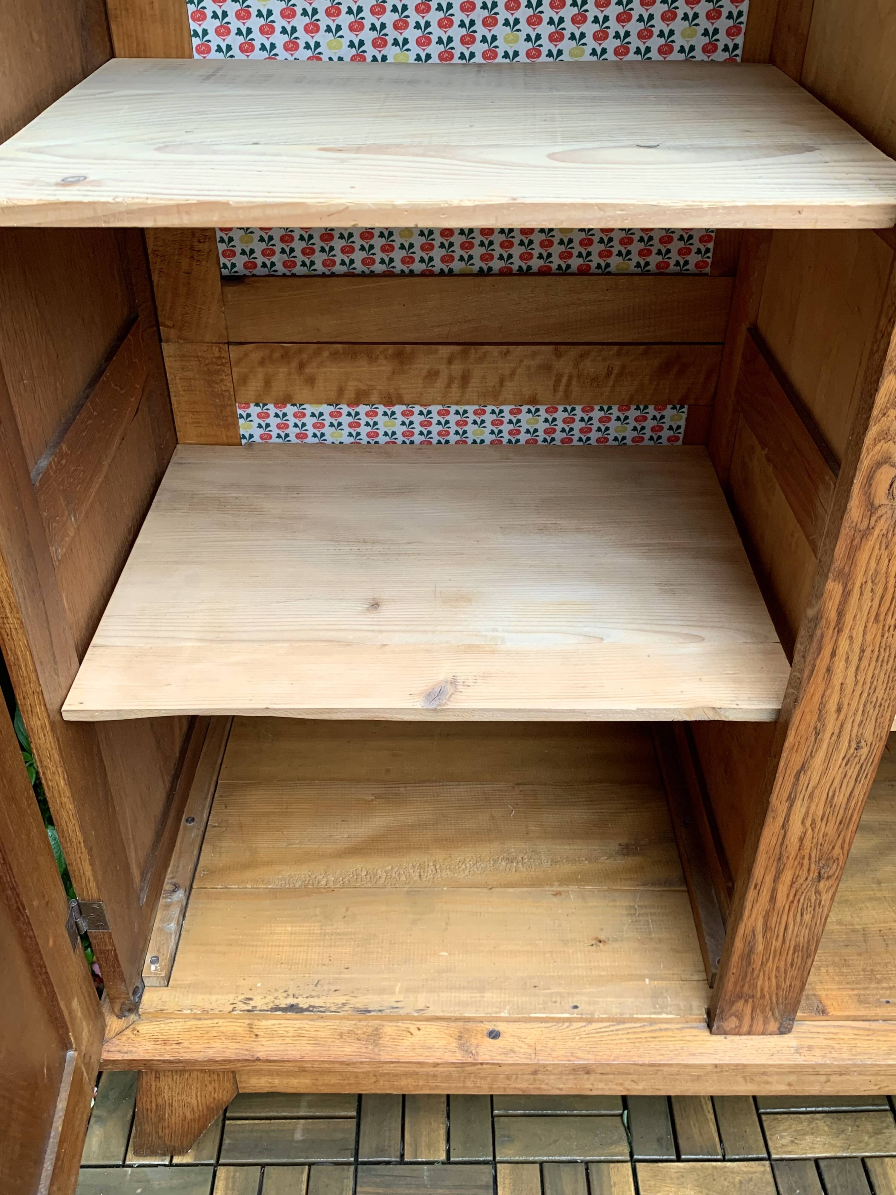 Solid oak compass foot cabinet René Gabriel 1945