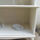 Vintage library enhanced in beige, wooden top.