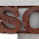 Rusty metal plate HOME