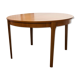 Scandinavian table in round teak with built-in extensions 1960