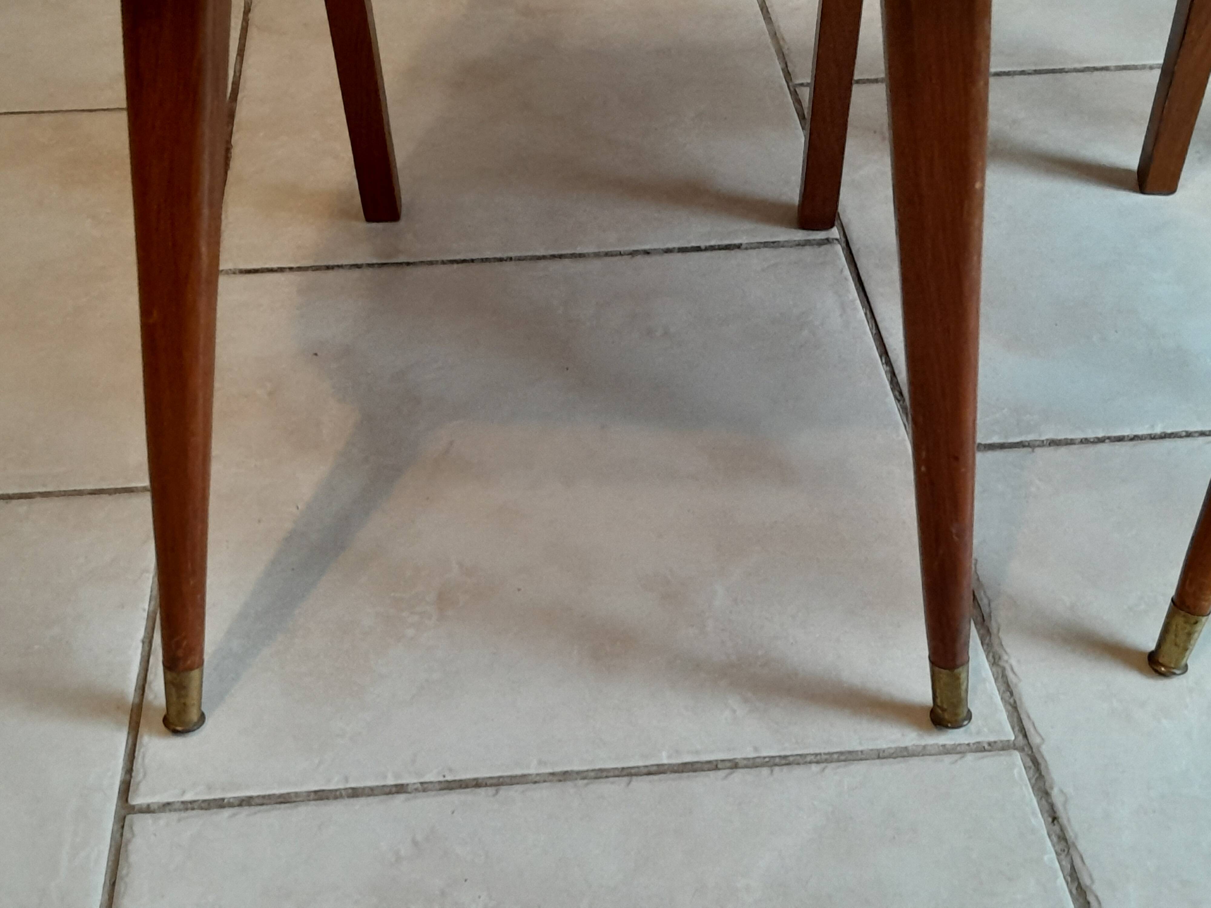 Pair of vintage red moumoute chairs with compass legs