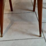 Pair of vintage red moumoute chairs with compass legs
