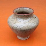 Glazed ceramic spinning top vase with speckled decor