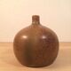 Sandstone ball vase signed Michel Dumont