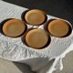 Set of 4 flat dinner plates in stoneware, no brand underneath.