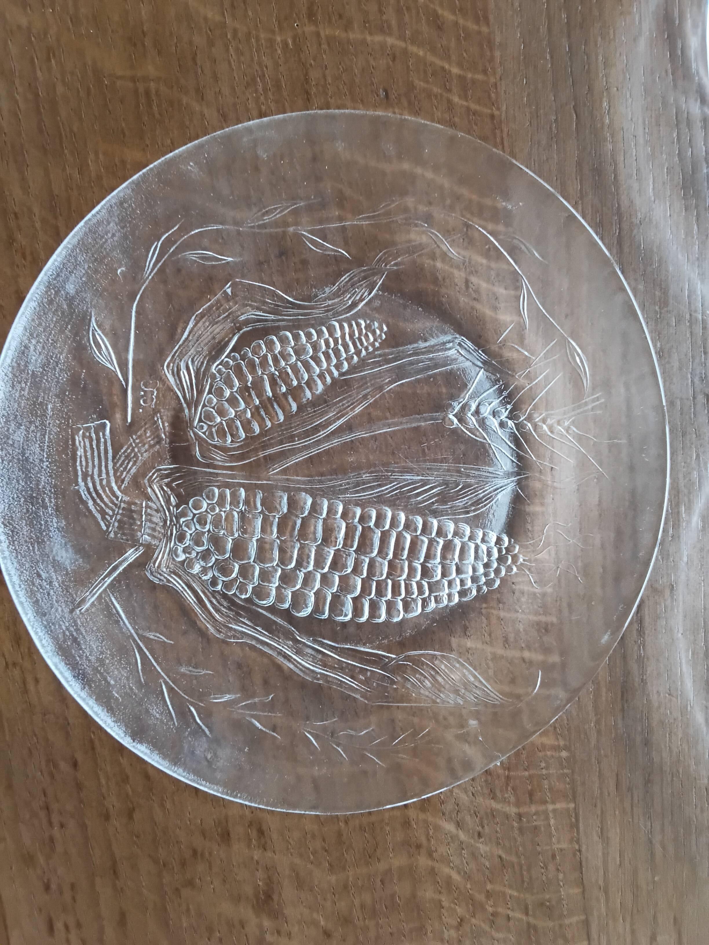 Set of six Duralex dessert plates.