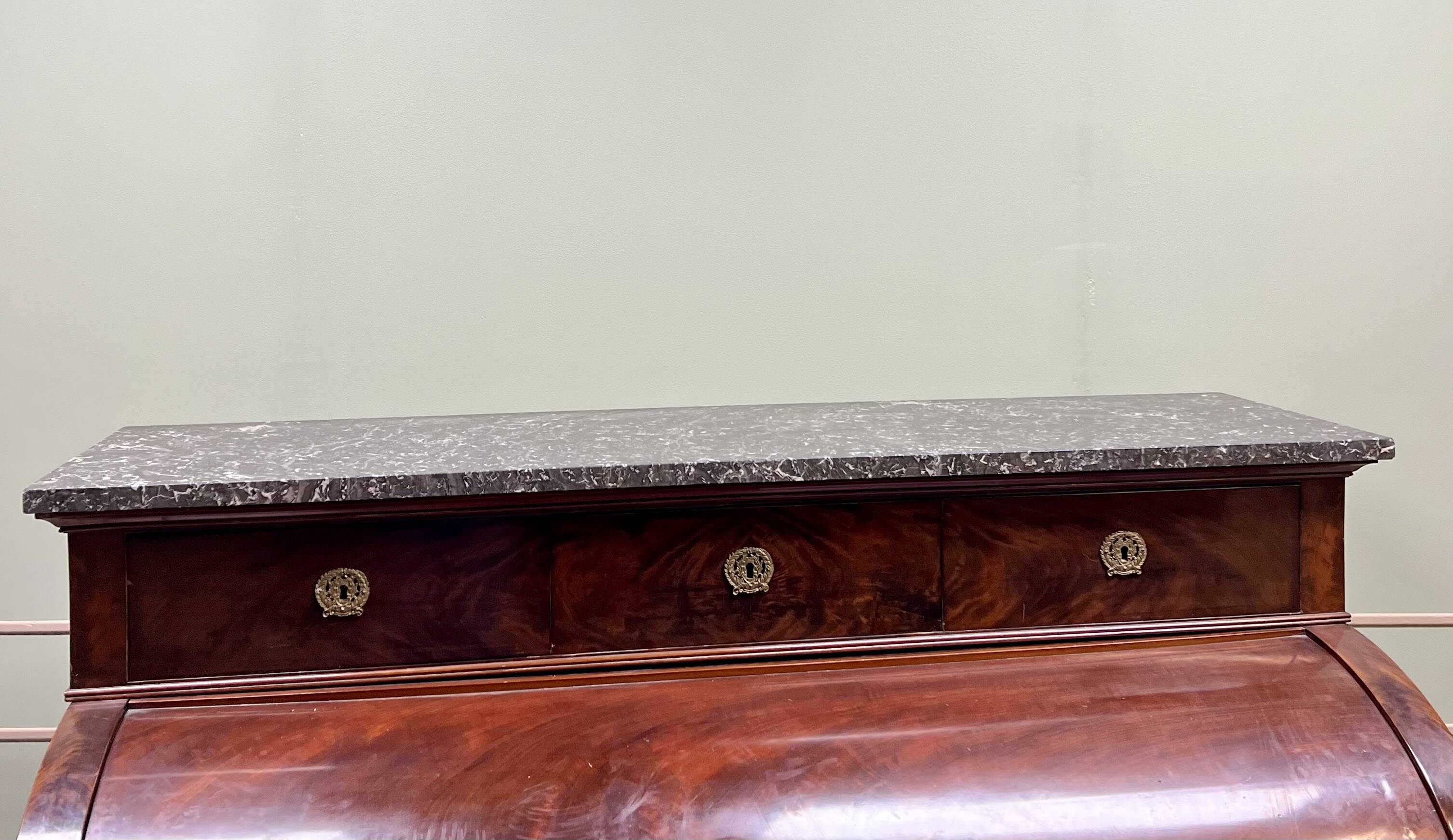 Cylinder desk in flamed mahogany empire style 19th century