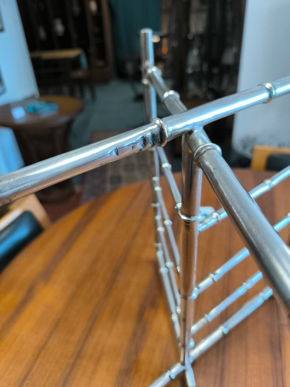 Chrome-plated brass magazine rack circa 1970