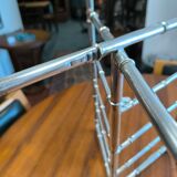 Chrome-plated brass magazine rack circa 1970