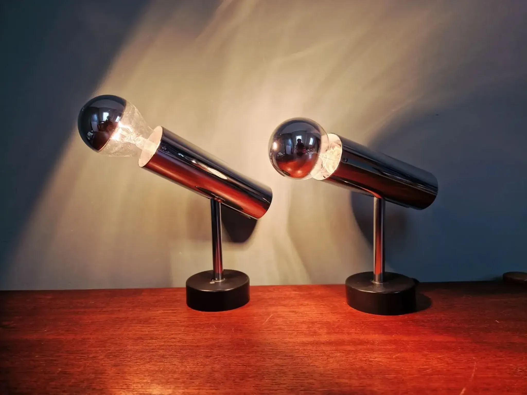 Pair of chrome metal wall lights, Staff Leuchten, Germany, 1970.