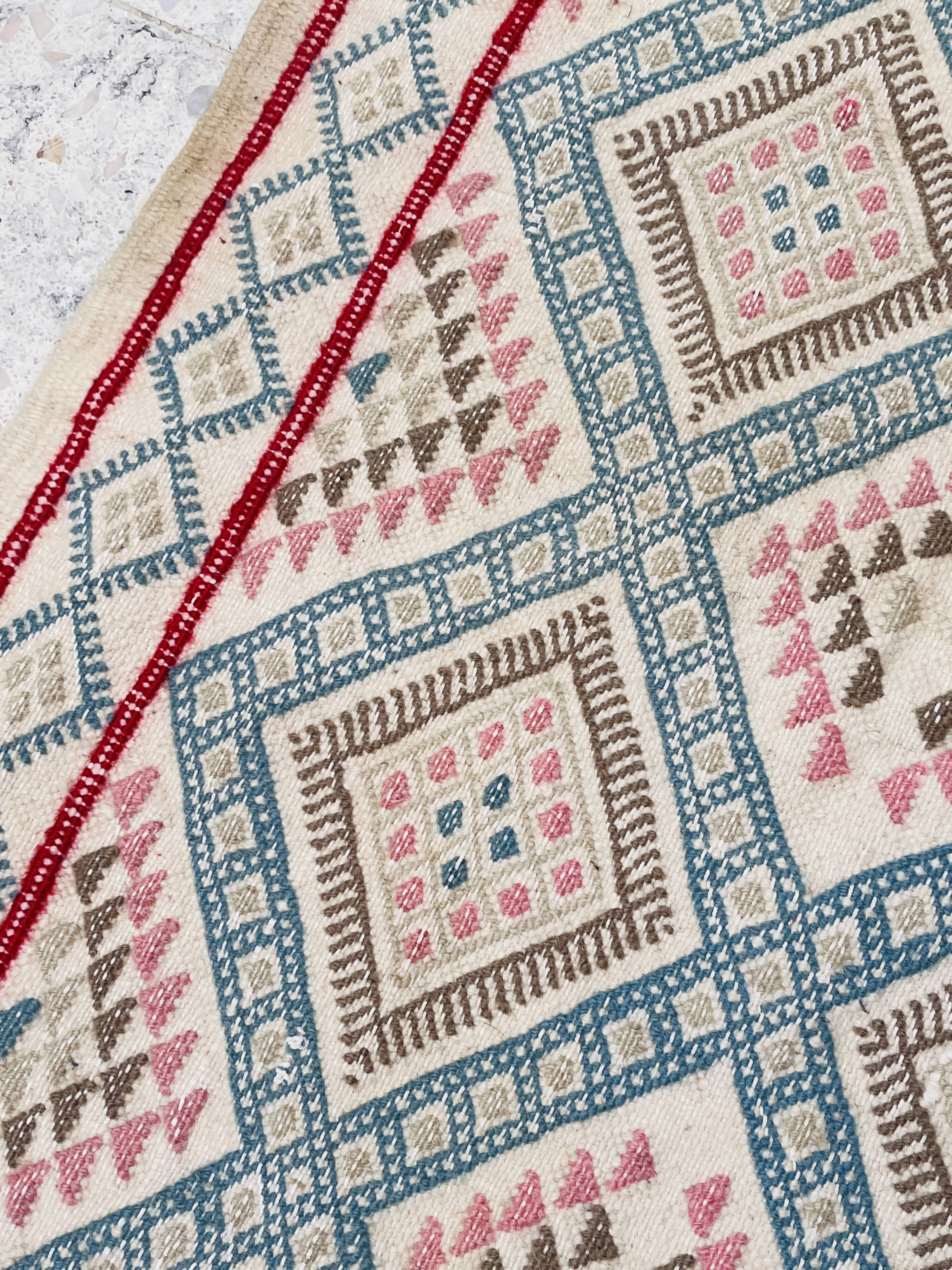 Handmade vintage Tunisian rug