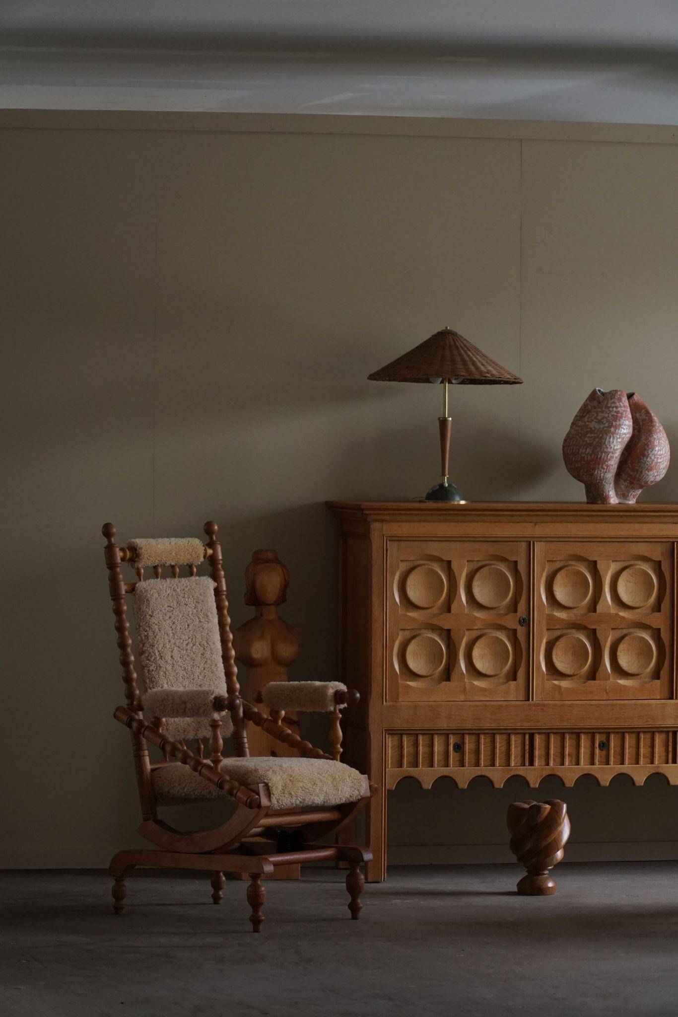 Pair of sculptural Danish modern rocking chairs in lambswool and oak, brutalist, 1950.