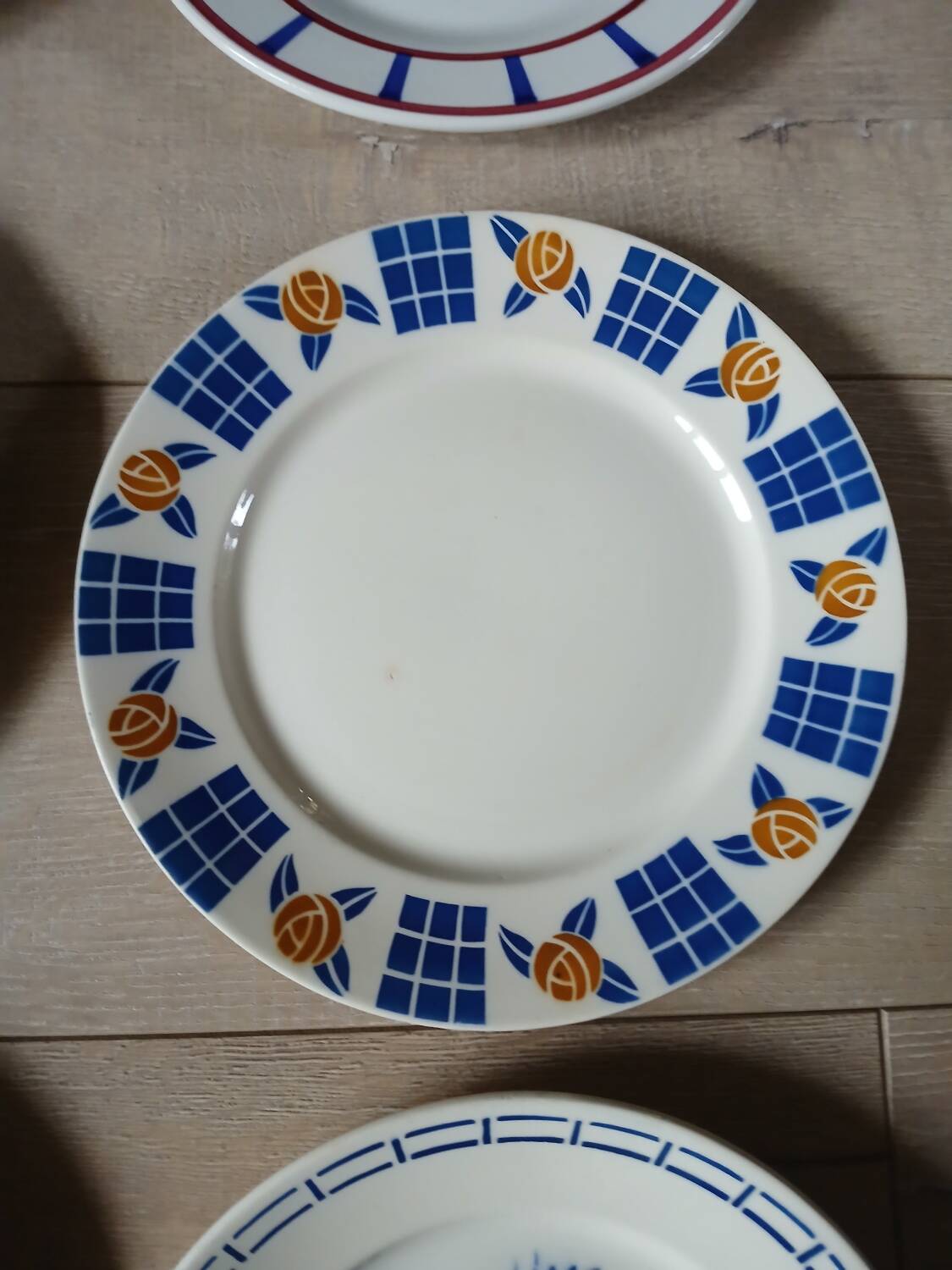 12 mismatched antique dinner plates