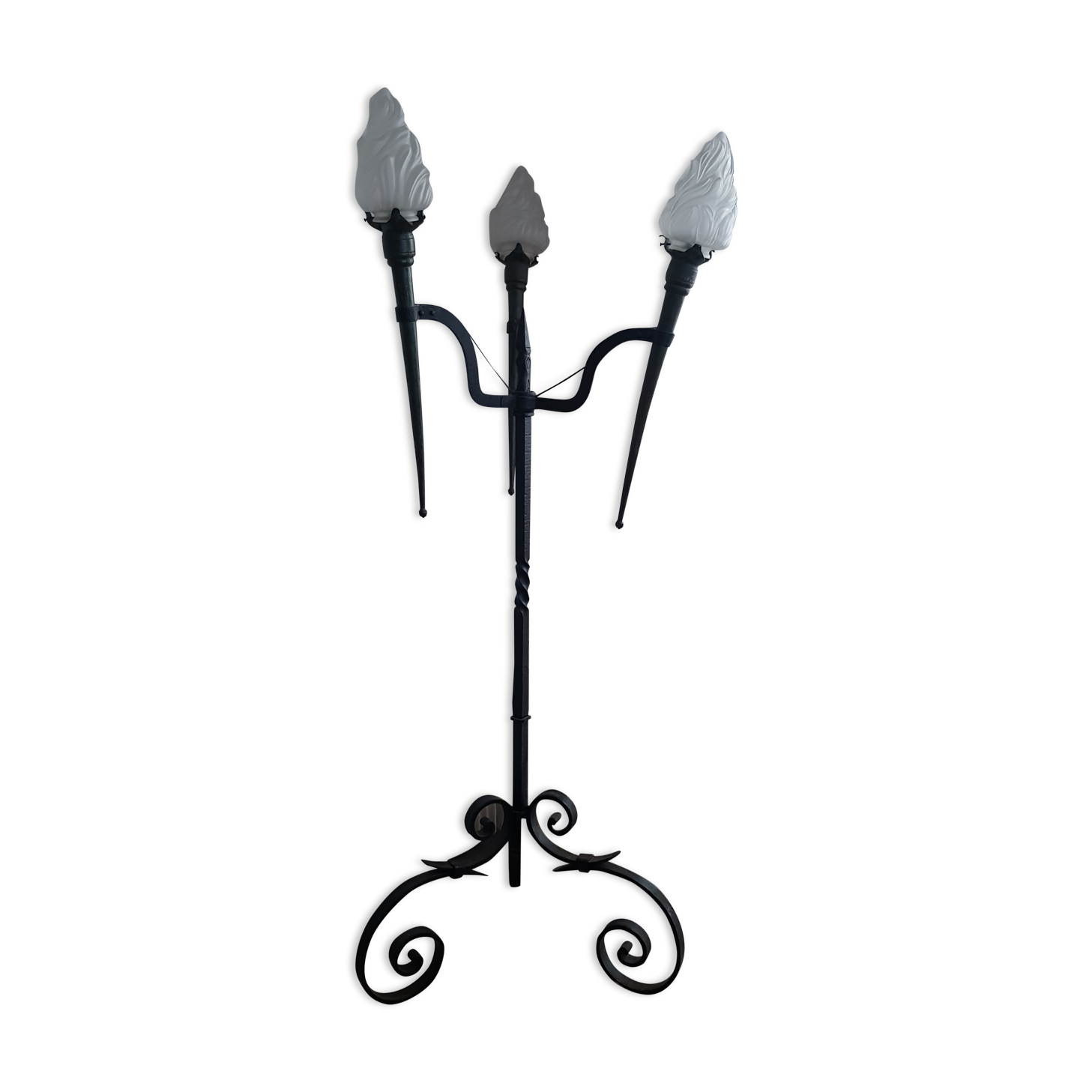 Old wrought iron tripod lamppost