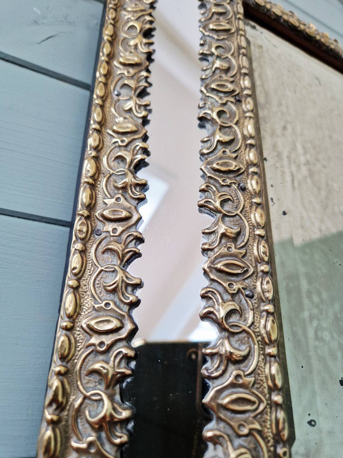 Mirror with embossed brass and mercury glass glazing beads, 19th century