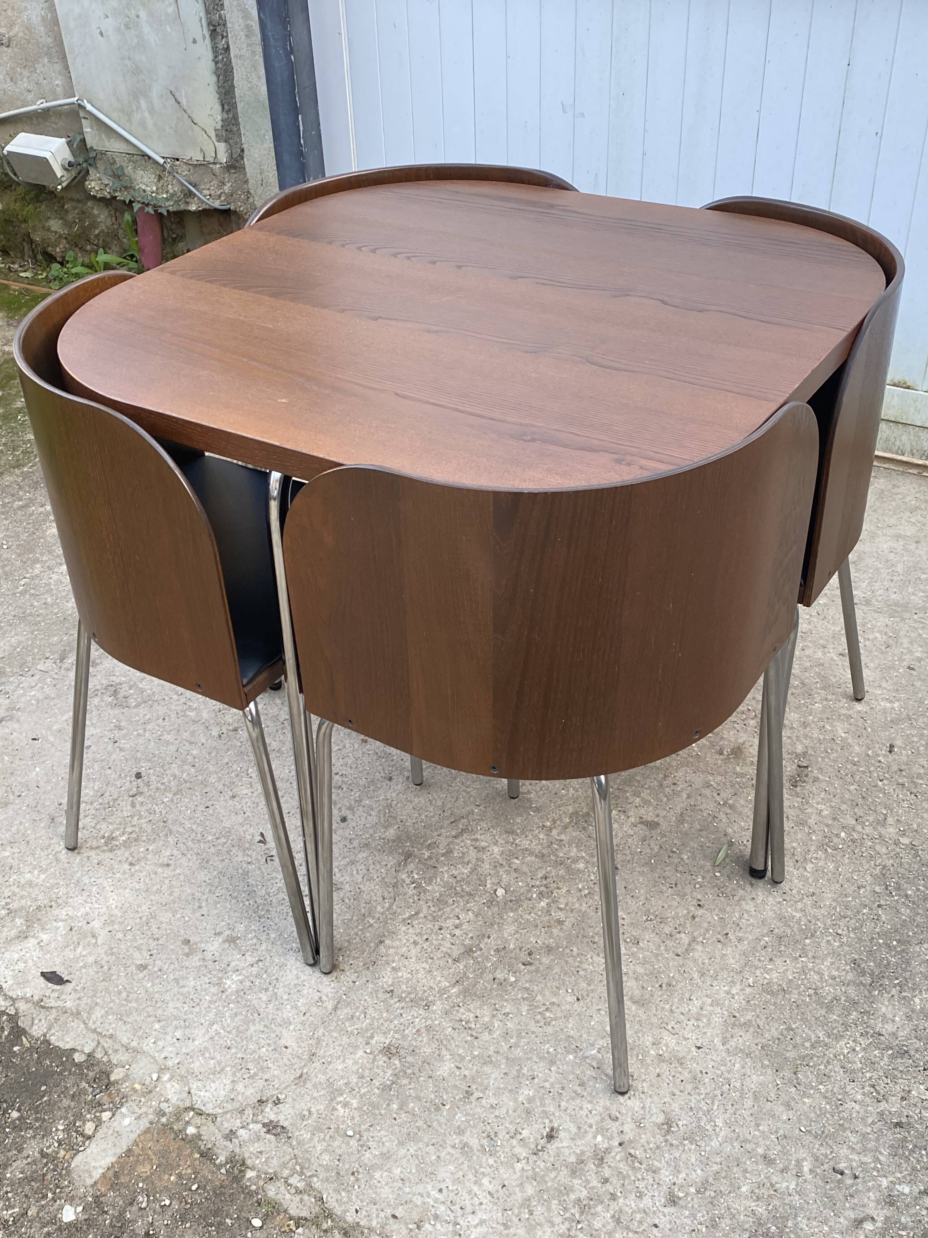 Fusion table and 4 teak chairs by Sandra Kragnert IKEA.