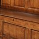 Antique English oak hall bench from the early 19th century with storage space