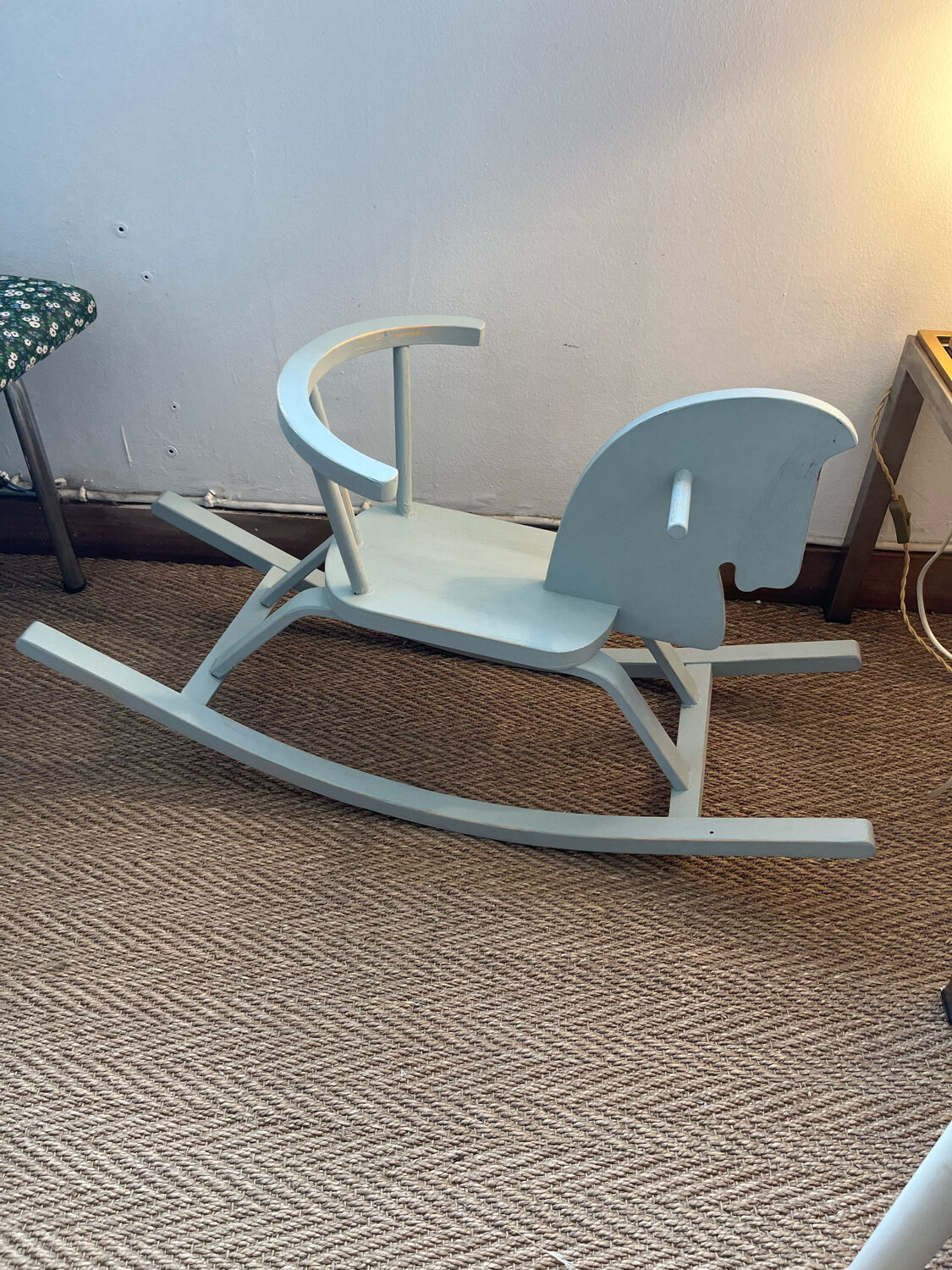 Vintage wooden rocking horse in its patina