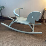 Vintage wooden rocking horse in its patina