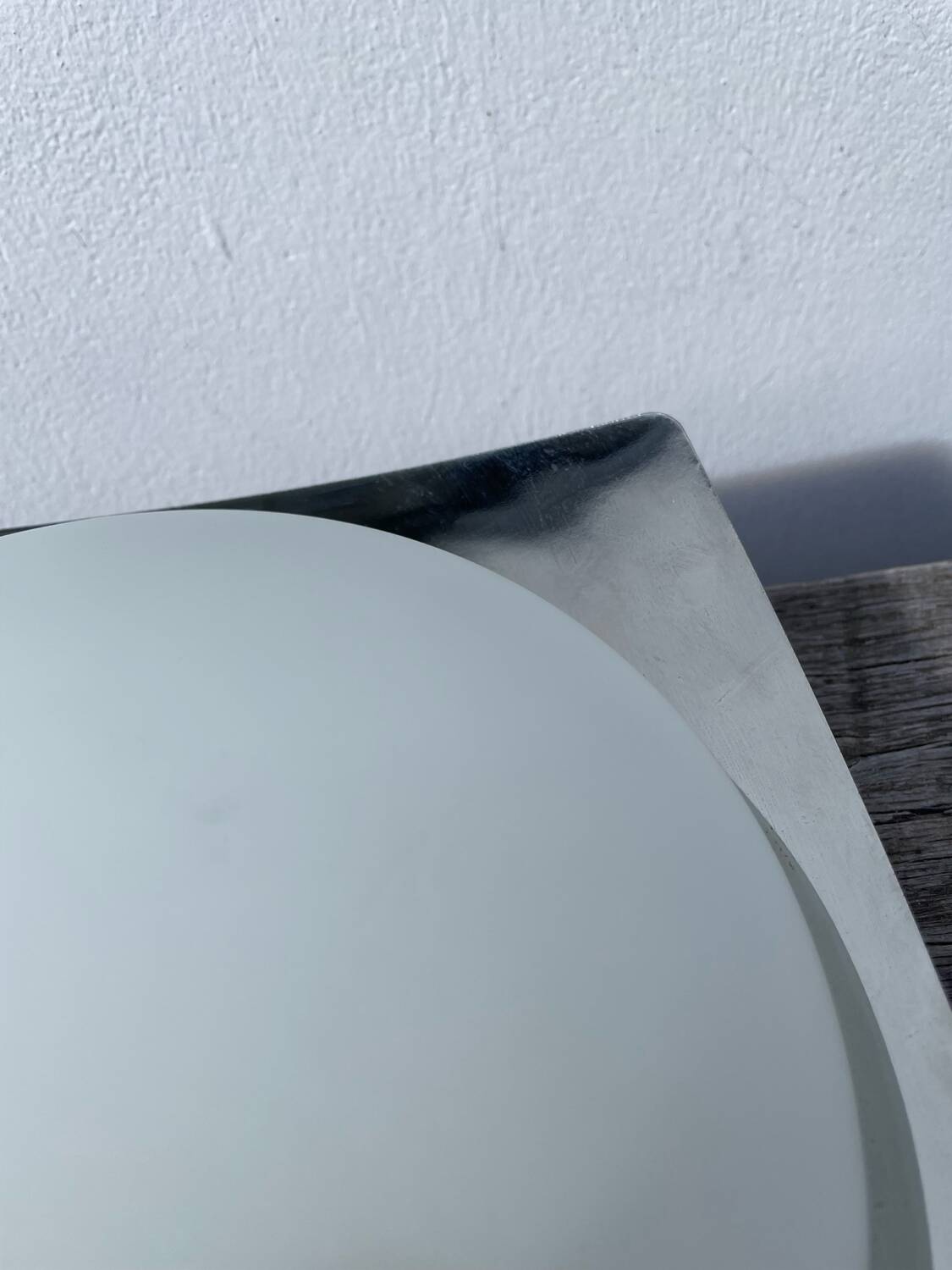 White glass and stainless steel ceiling light