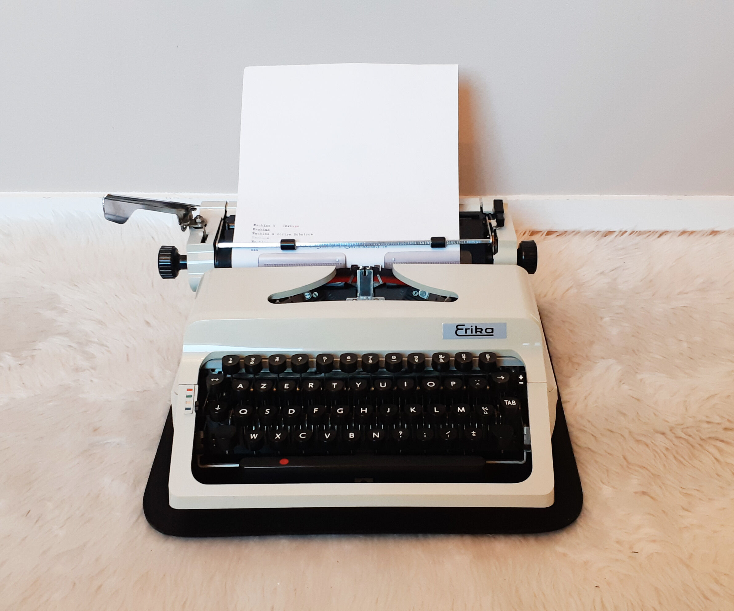 Portable, functional typewriter with user manual