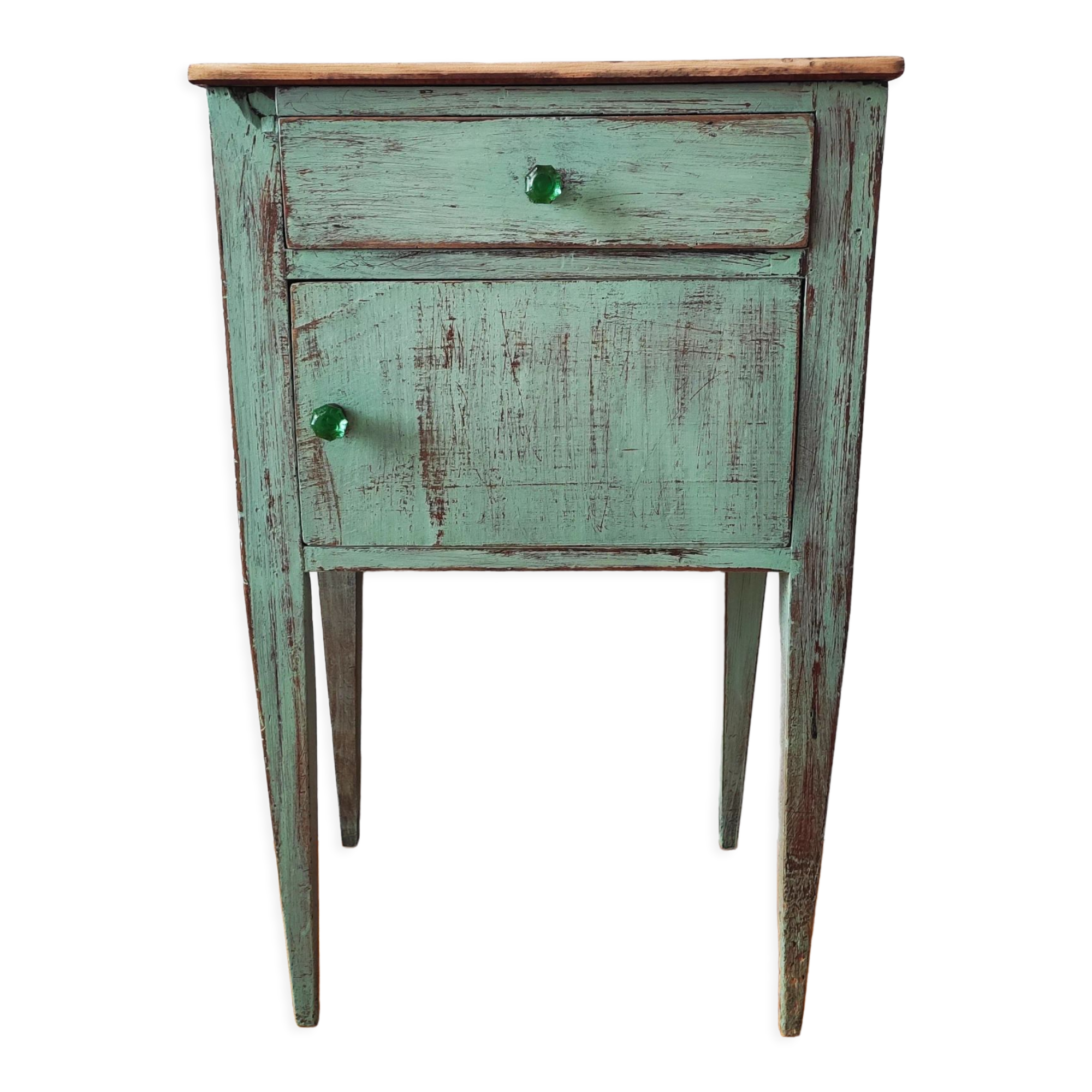 Patinated bedside table end of sofa