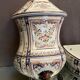 Wall fountain in earthenware with Rouen decoration