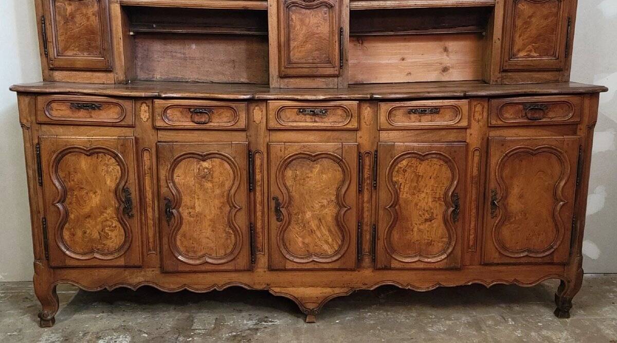 Clockside cabinet from the Louis XV period in walnut and elm, fully carved.