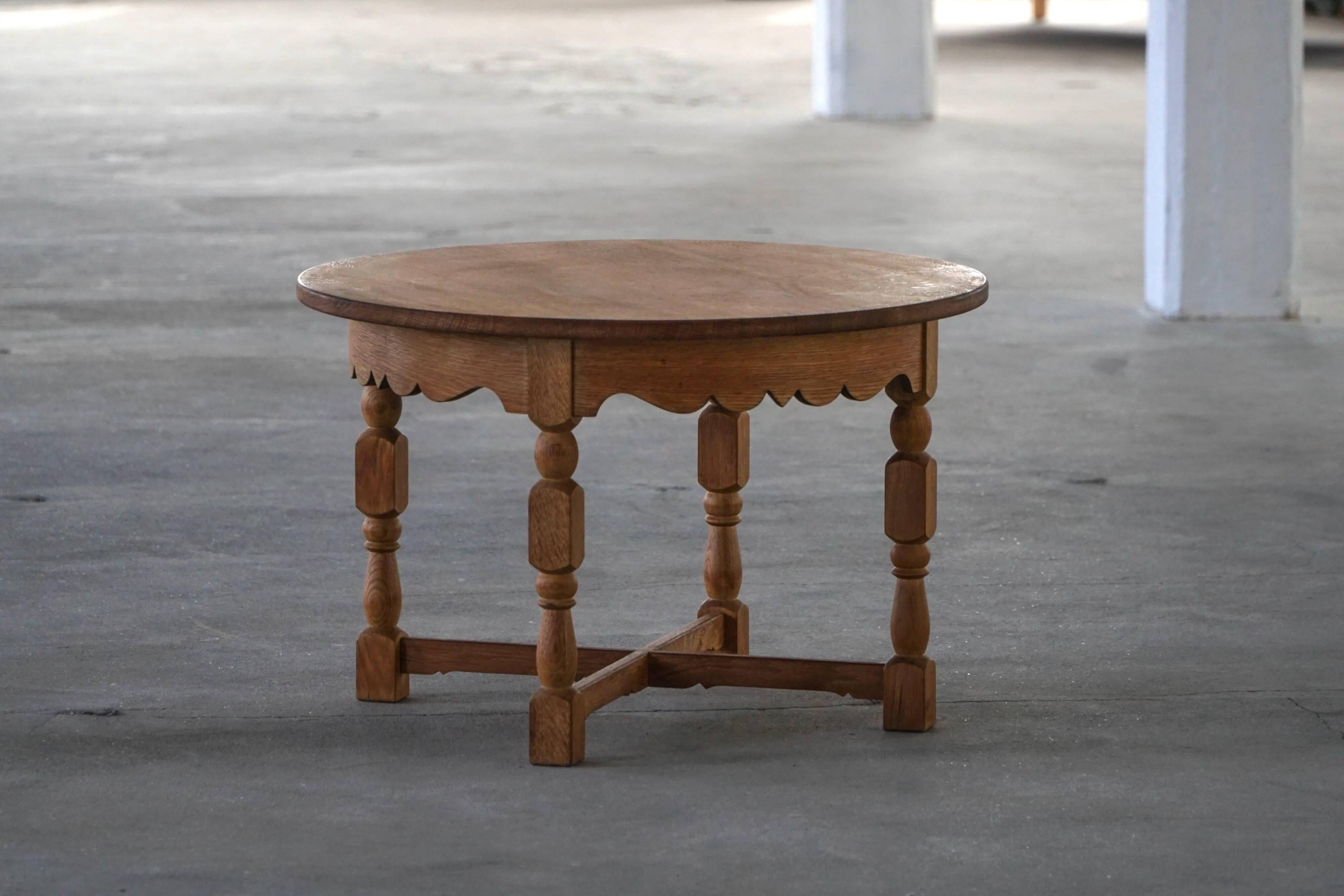 Mid-century Danish round side table in solid oak, Henning Kjærnulf, 1960s.