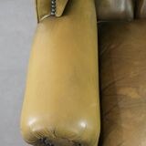 Moss green cow leather Chesterfield wingback armchair in English style