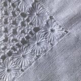 Rectangular tablecloth with embroidered openwork pattern