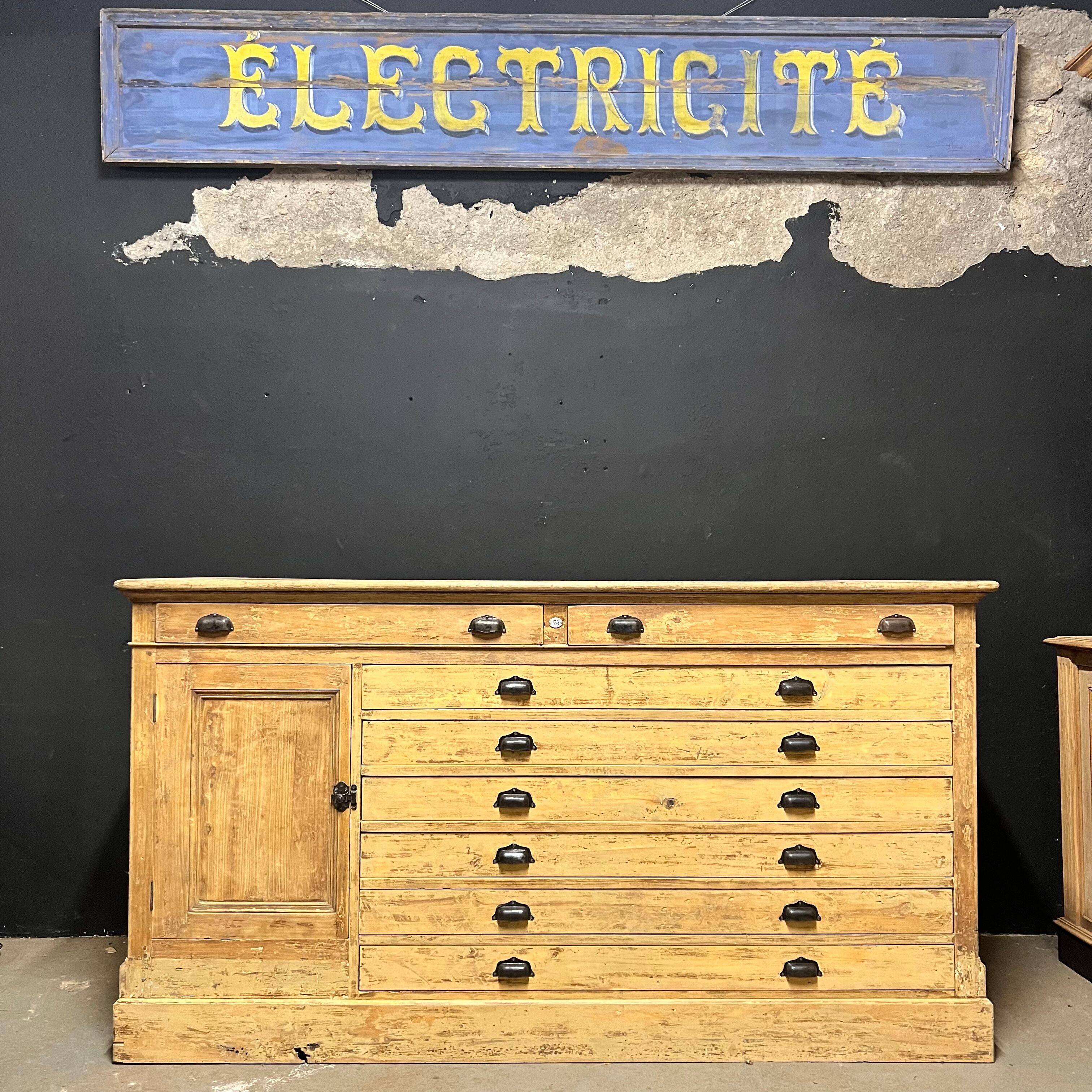 Old piece of furniture by trade with an architect's plan