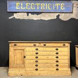 Old piece of furniture by trade with an architect's plan