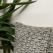 Bi-sided cushion beige black white pattern