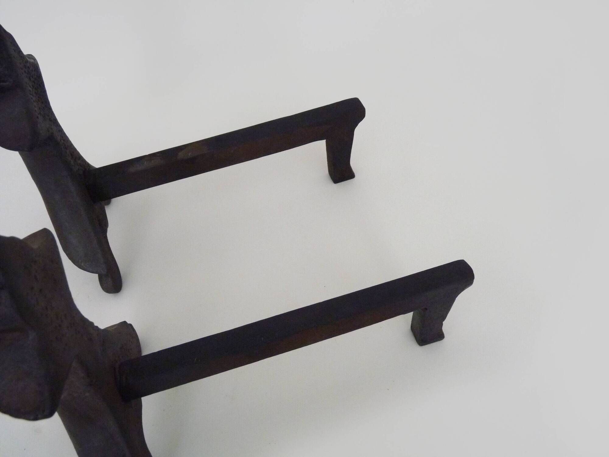 Pair of cast iron fireplace andirons. France, 19th century.
